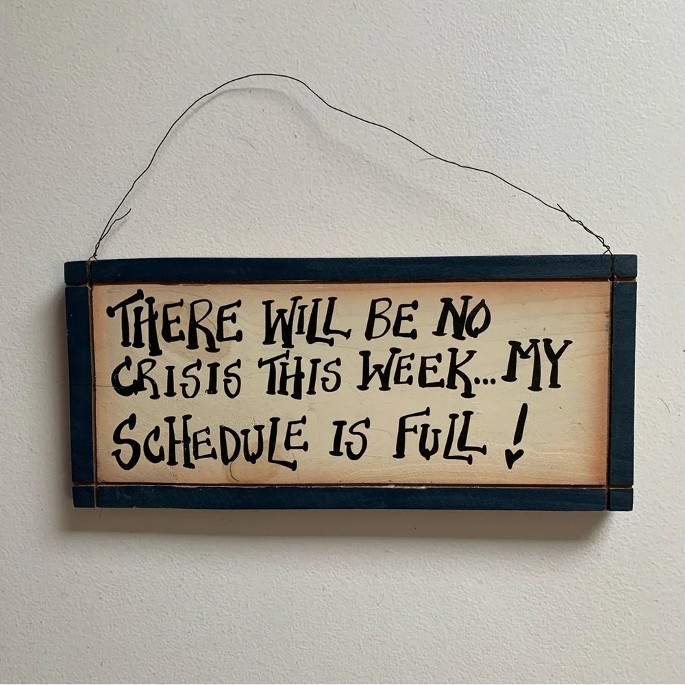 Wooden Wall Sign - “There Will Be No Crisis This Week - My Schedule Is Full!”